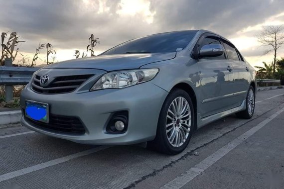 Pearl White Toyota Corolla Altis 2014 for sale in Maragondon