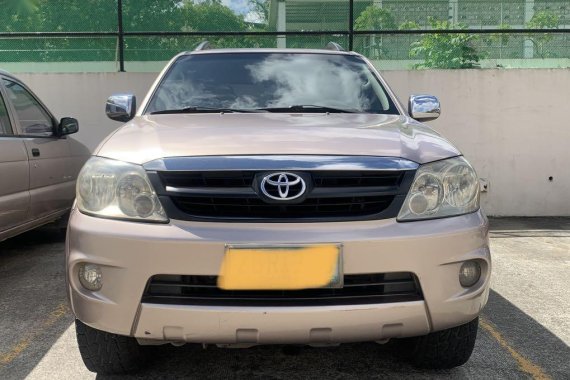 Pearl White Toyota Fortuner 2006 for sale in Balete 
