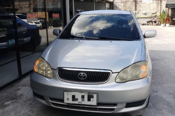 Pearl White Toyota Corolla Altis 2003 for sale in Quezon