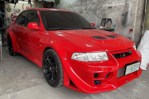 Selling Red Mitsubishi Lancer Evolution 1999 in Valenzuela