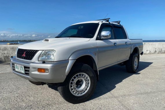 Selling Pearl White Mitsubishi L200 Strada 2003 in Manila