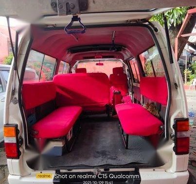 Pearl White Nissan Urvan 2013 for sale in Makati 