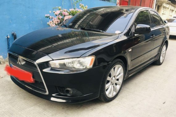 Selling Black Mitsubishi Lancer 2010 in Manila