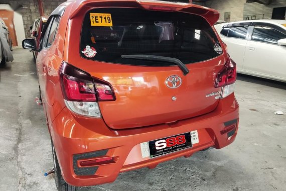 Selling Orange Toyota Wigo 2019 in Quezon City