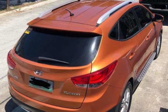 Selling Orange Hyundai Tucson 2013 in Biñan