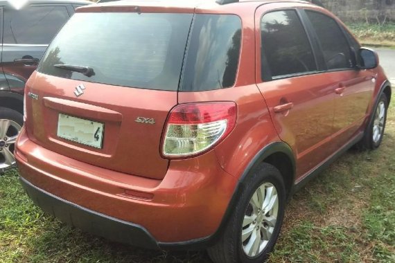 Red Suzuki SX4 2014 for sale in Quezon 