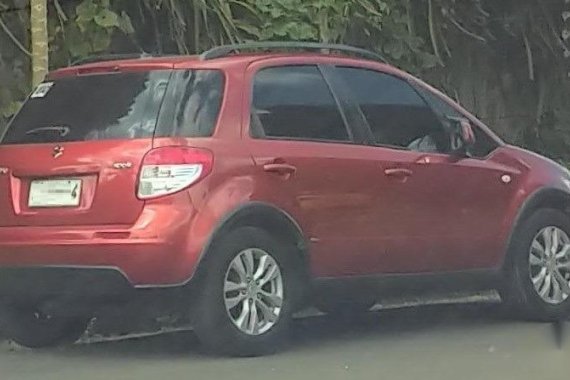 Red Suzuki SX4 2014 for sale in Quezon 