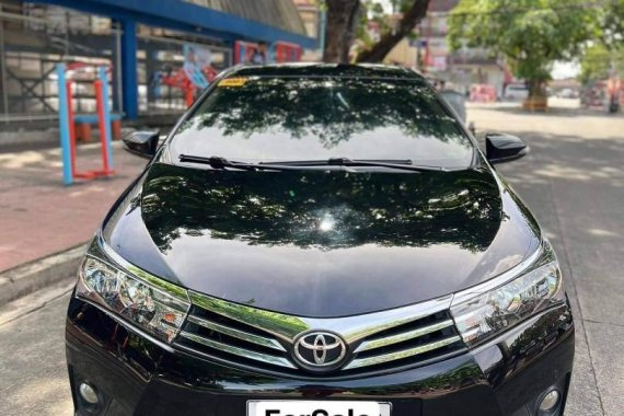 Selling Black Toyota Corolla Altis 2014 in Marikina