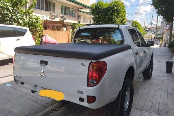 Sell White 2014 Mitsubishi Strada in Makati