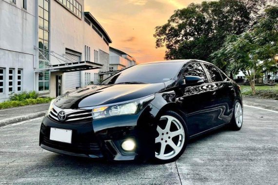 Sell Black 2014 Toyota Corolla altis in Quezon City