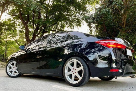 Sell Black 2014 Toyota Corolla altis in Quezon City