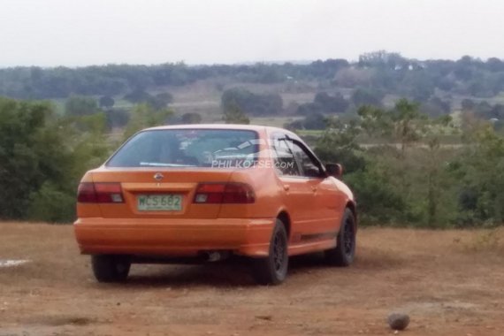 Selling old but goods 1998 Nissan Sentra B14/orange