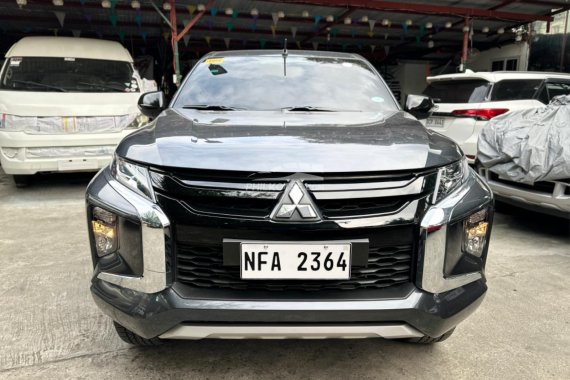 Selling repossessed Grey 2023 Mitsubishi Strada Pickup by trusted seller