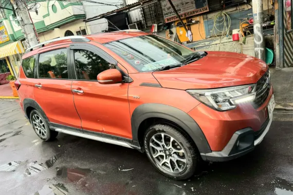 Selling a SUPER GOOD CONDITION 2021 Suzuki XL7 GLX A/T in Orange