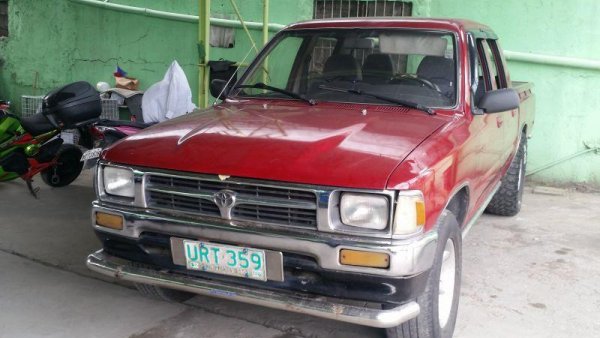 1999 maroon toyota hilux 4x4 pickup