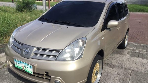 grand livina 2011 price