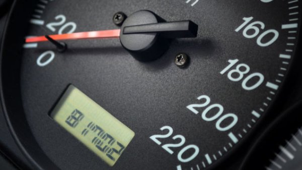 The mileage is shown clearly on the odometer. Car odometer