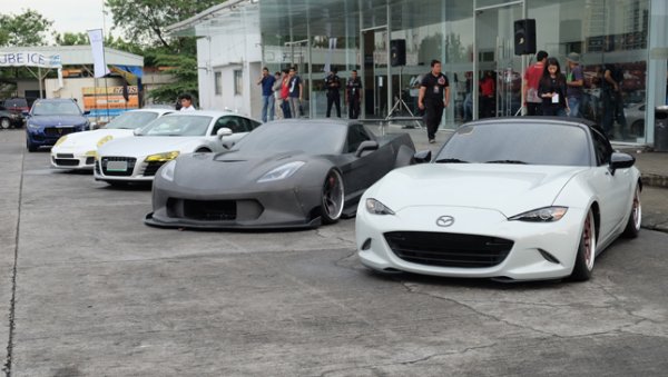 A fleet of desirable cars were on display just outside of the venue Cars are on display at the event