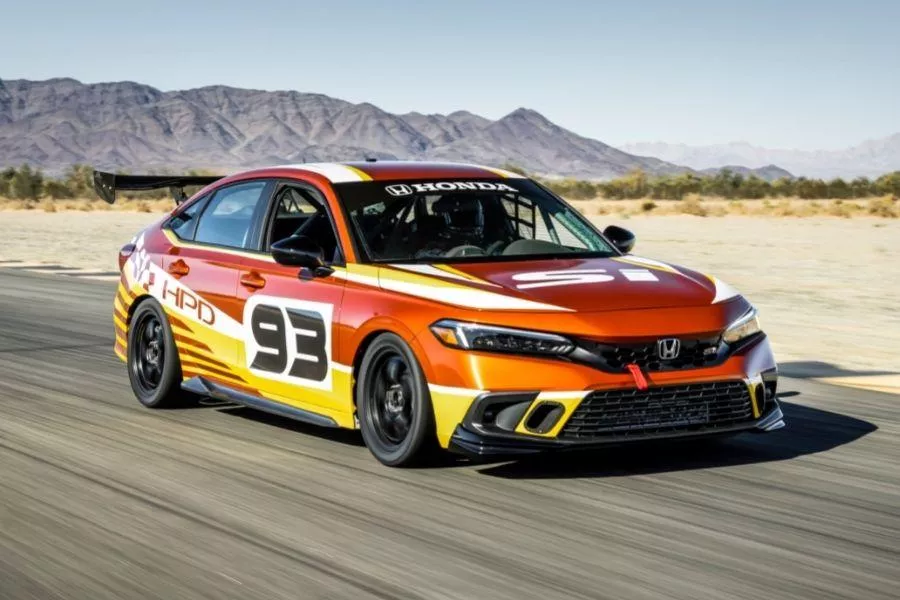 A picture of the HPD Civic Si Race Car prototype on a race track