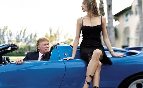 Trump and a girl in a blue Lamborghini Diablo
