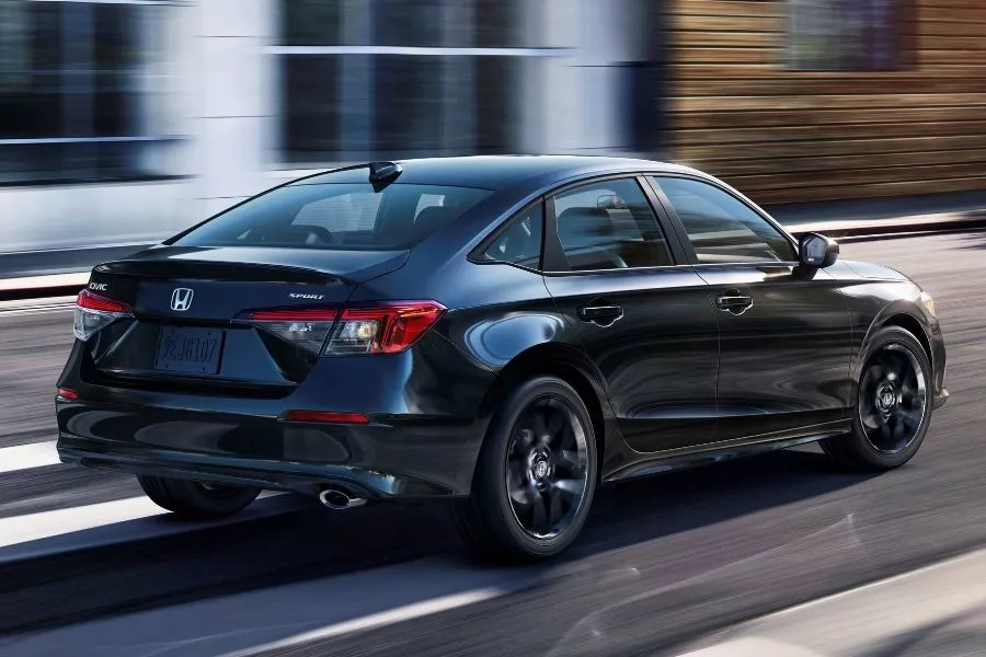 A picture of the 2022 Honda Civic as it travels on a road