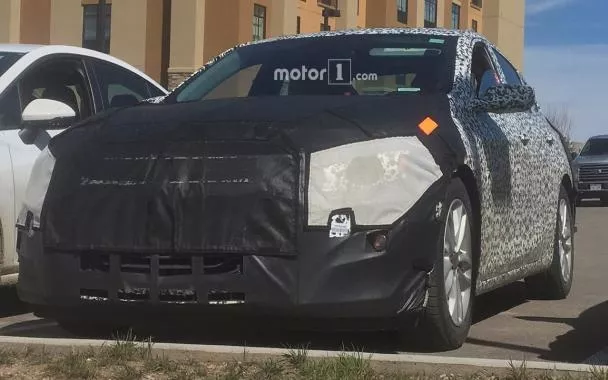 Under the camouflage, the new Chevrolet Malibu appears to be the same as the current version. Spy photos: 2019 Chevrolet Malibu front view