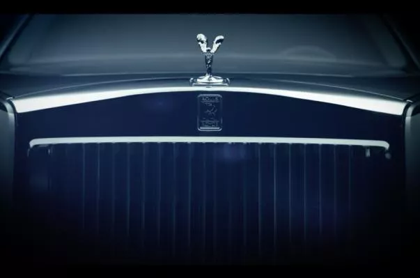 Fist teaser image of the Rolls-Royce Phantom VIII with new front grille and a Spirit of Ecstasy