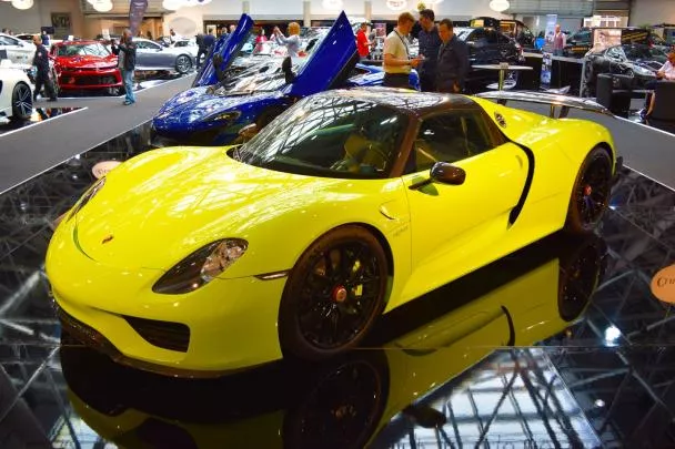 Porsche 918 Spyder Acid Green angular side view at Top Marques Monaco