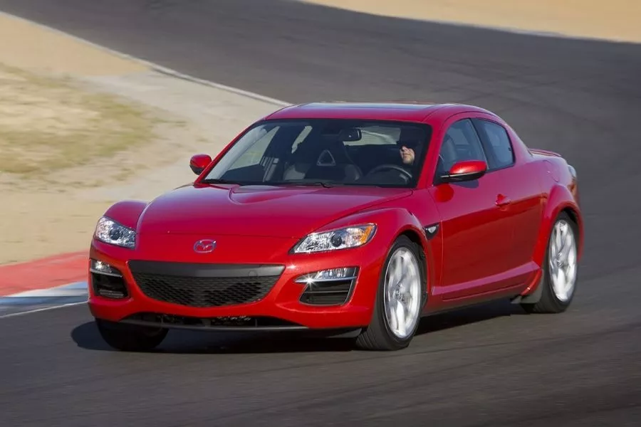 A picture of the 2009 Mazda RX-8 on a race track
