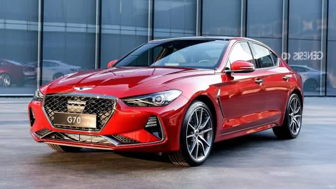 A red Genesis G70 angular front view