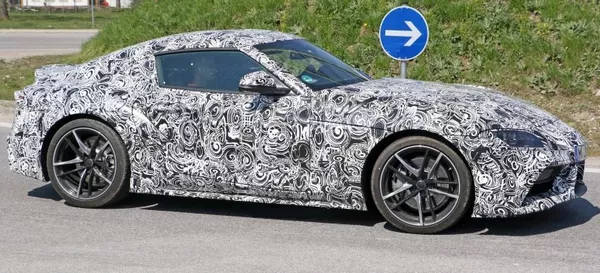 The side of the camoflaged Toyota Supra 2019
