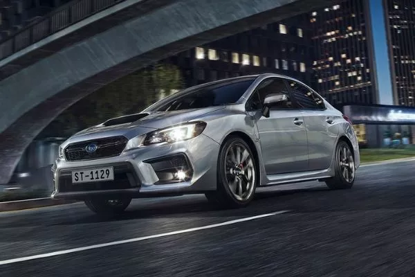 A picture of the 2020 Subaru WRX in the city at night