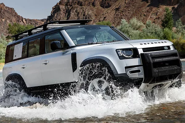 2020 Land Rover Defender crossing a river