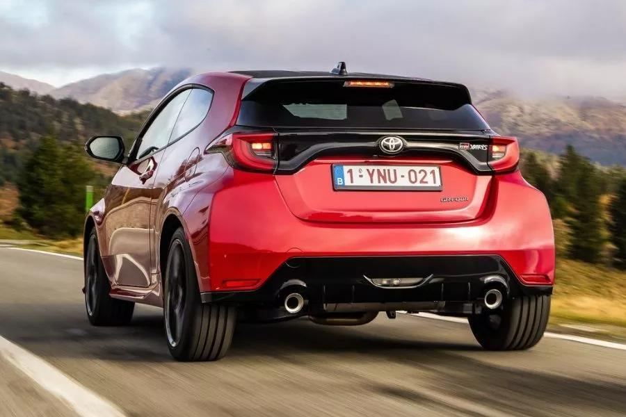 A picture of the Toyota GR Yaris' rear end as it drives on a road