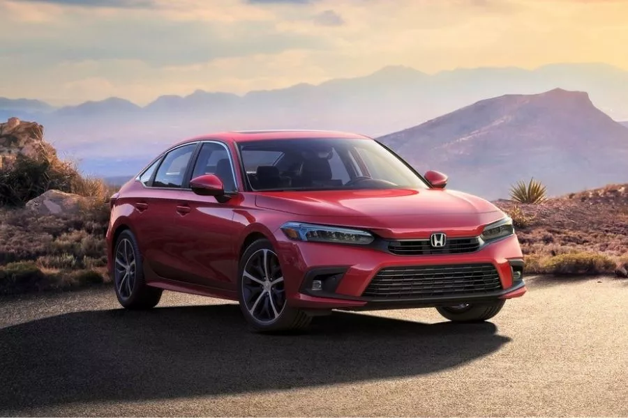 A picture of the production model 2022 Honda Civic parked on a desert road