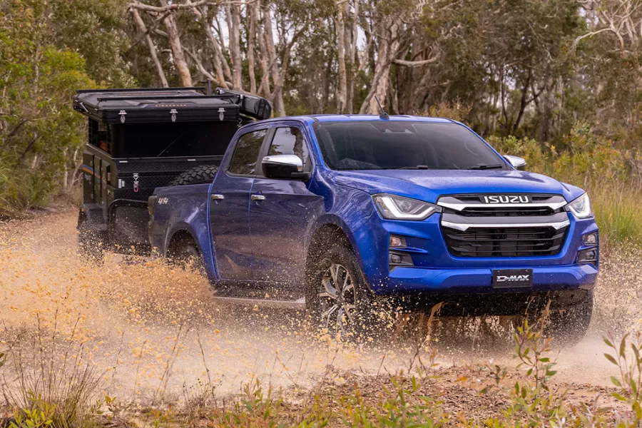 A picture of the 2023 Isuzu D-Max towing a trailer