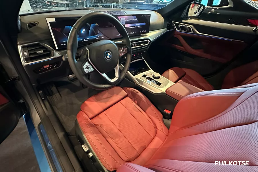 A peek inside the BMW i4's front cabin