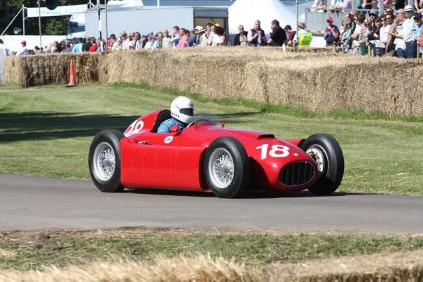 A racer in a Lancia D50 (1954-6) at Goodwood Festival of Speed 2011