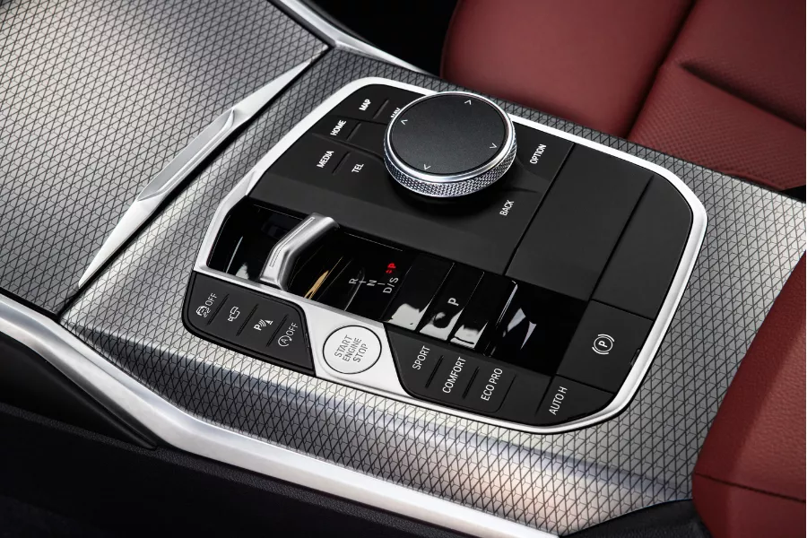 A closeup of its center console A picture of the new 3 Series's shift lever