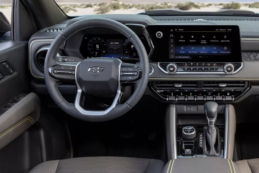 Many will like its contemporarily designed dashboard A picture of the Colorado's dashboard and steering wheel.