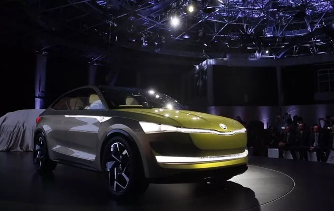 The car also offers twin electric motors, a power output of 225 kilowatts. A brown Vision E displayed at Shanghai Auto show
