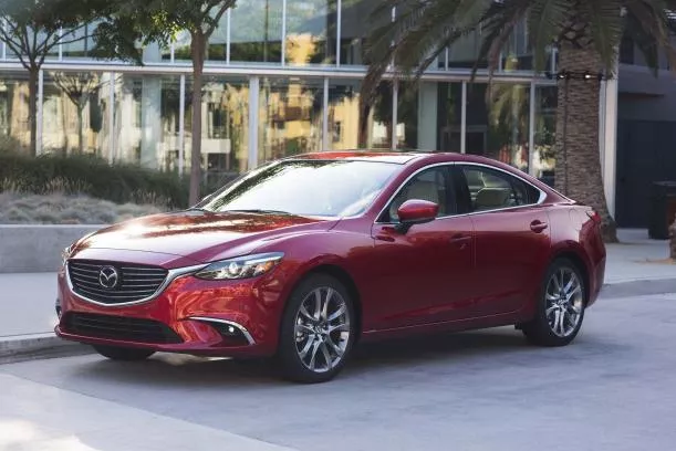 Angular front of a red Mazda 6 2017