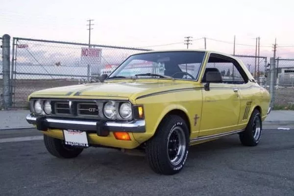 70s dodge colt on the road