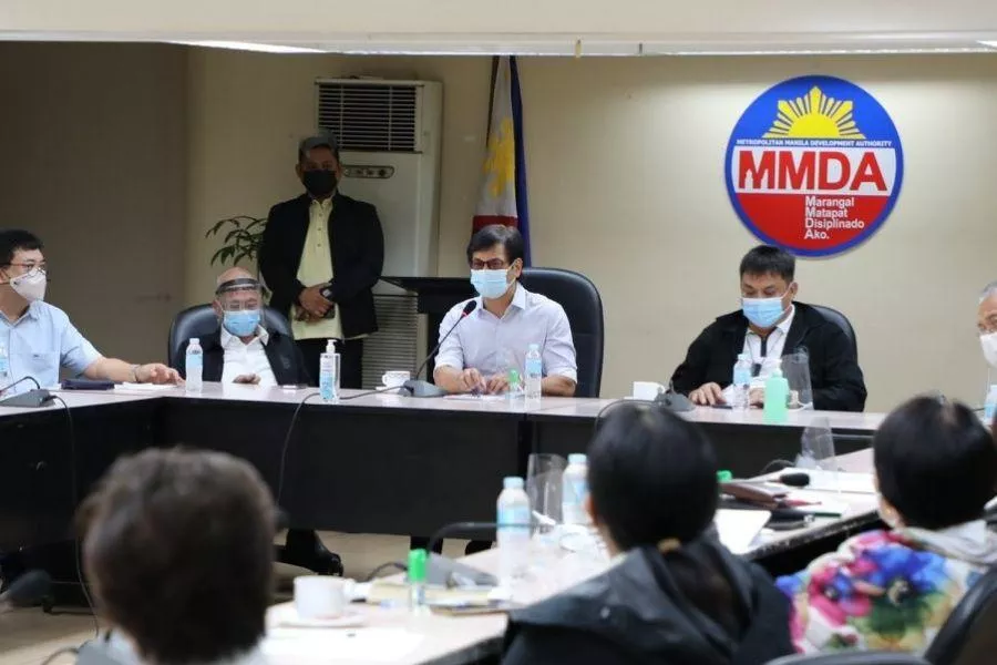 A picture of the former MMDA chairman Abalos in a meeting