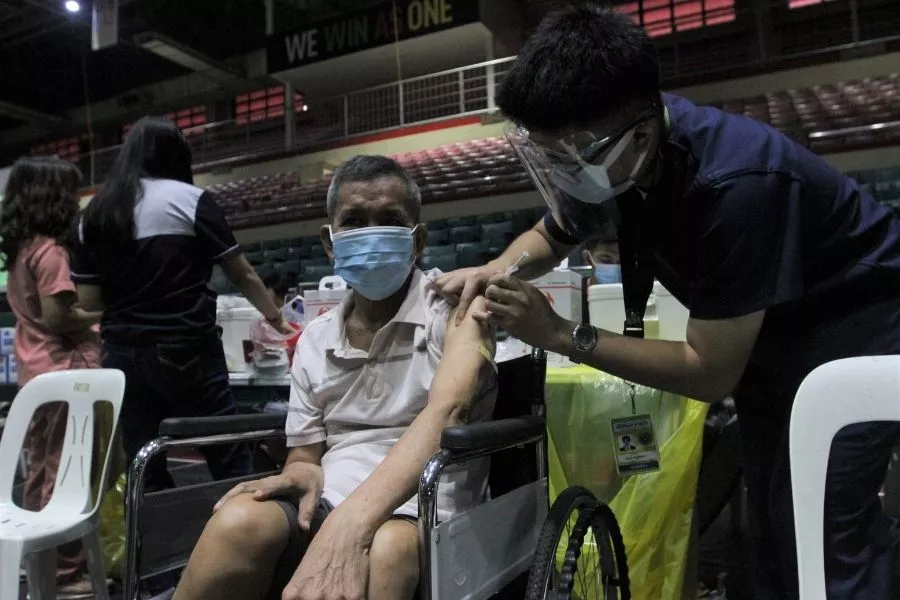 Elderly patient being vaccinated