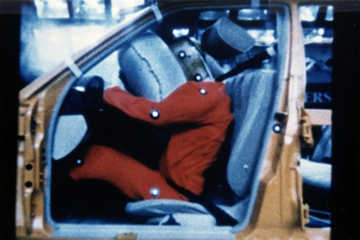 A picture of crash testing with seatbelt tensioner and airbag