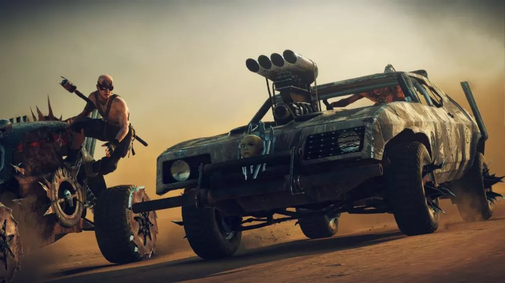 A scene from Mad Max with two armored tanks on desert