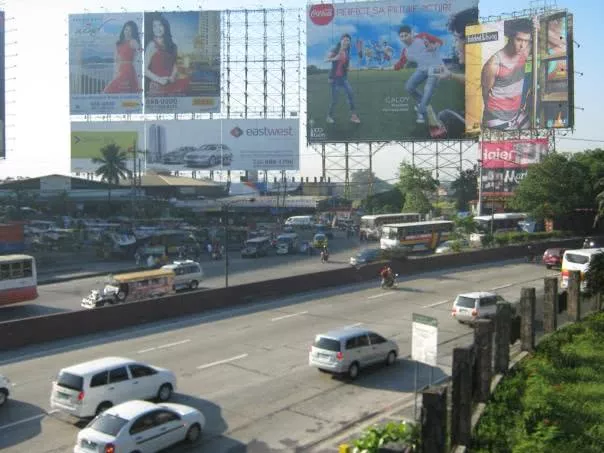 Streets in the area are occupied by illegally parked vehicles Vehicles moving on the roads