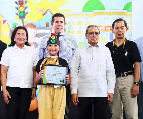 People awarding the 2016 Young Road Safety Champion 