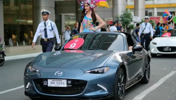 2017 Binibing Pilipinas A beauty contestant in a mazda MX-5 smiles to onlookers at the 2017 Binibing Pilipinas pageant